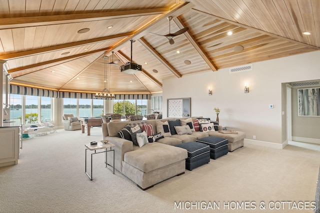 carpeted living room featuring an inviting chandelier, high vaulted ceiling, wood ceiling, a water view, and beam ceiling