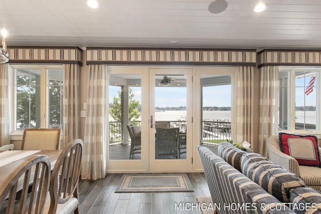 entryway with a water view and plenty of natural light