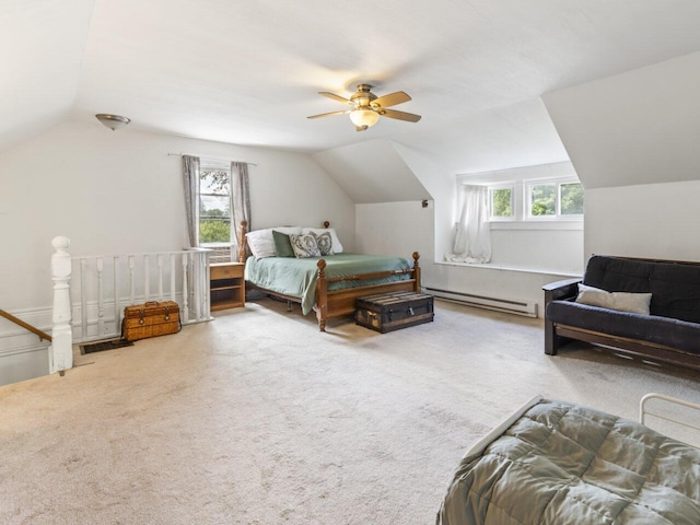 bedroom with lofted ceiling, a baseboard heating unit, ceiling fan, and carpet flooring