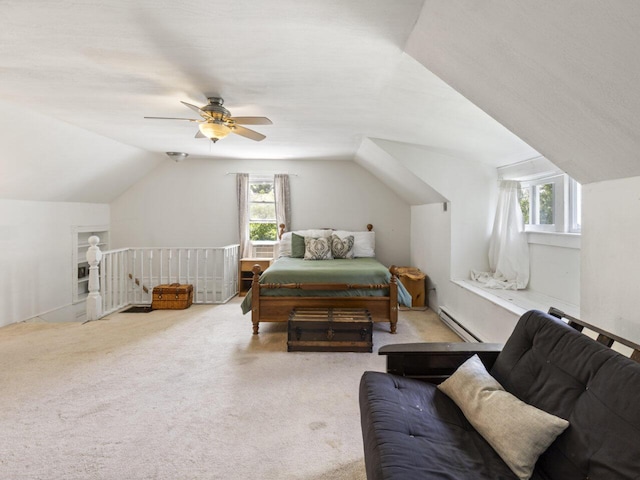 carpeted bedroom featuring ceiling fan, lofted ceiling, multiple windows, and a baseboard heating unit