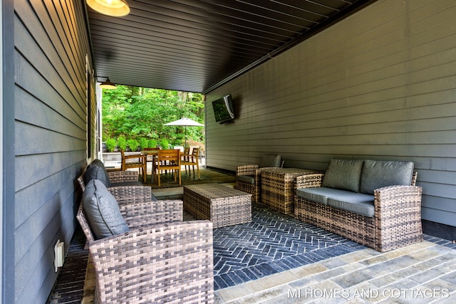 view of patio with an outdoor living space