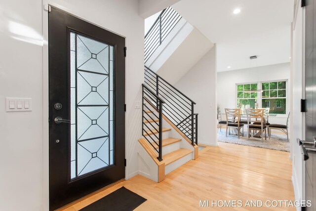 entryway with light hardwood / wood-style flooring