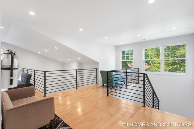 sitting room with light hardwood / wood-style flooring