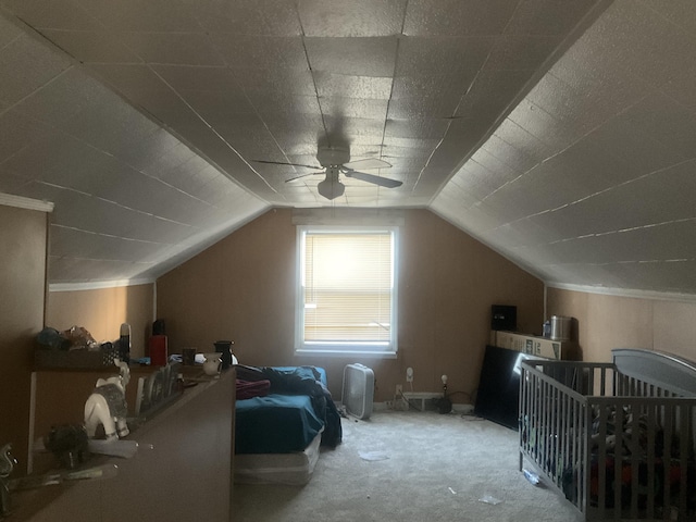 interior space featuring lofted ceiling and carpet flooring