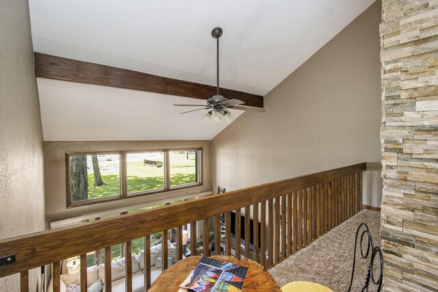 hallway featuring lofted ceiling with beams