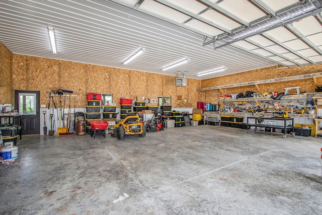 garage featuring a workshop area