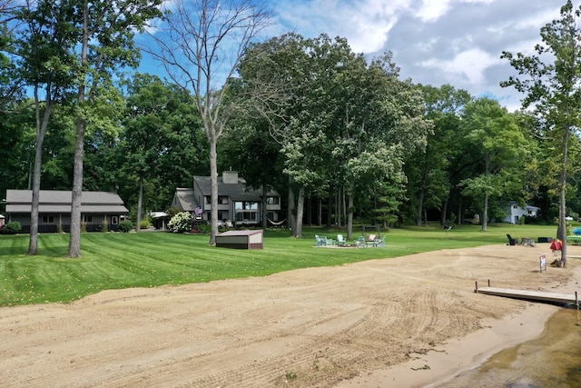 view of community with a yard