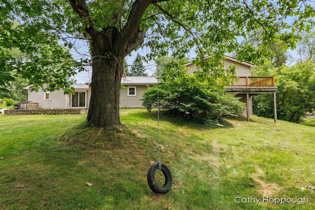 view of yard featuring a deck