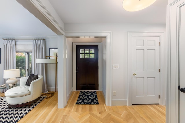 18760 Valencia St, Northville, MI 48168 - foyer entrance with baseboards and wood finished floors