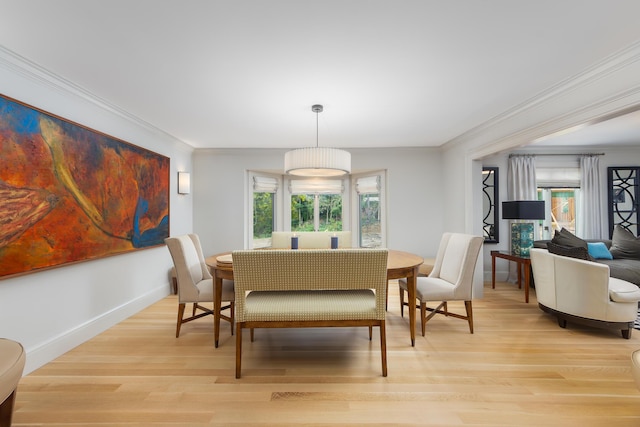 18760 Valencia St, Northville, MI 48168 - dining space with crown molding, baseboards, and light wood-type flooring
