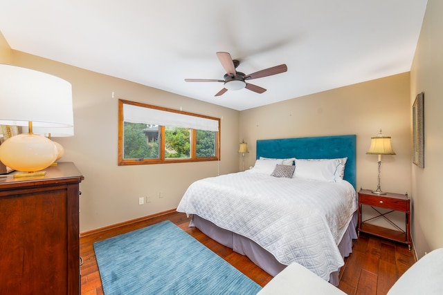 18760 Valencia St, Northville, MI 48168 - bedroom featuring baseboards, ceiling fan, and hardwood / wood-style flooring