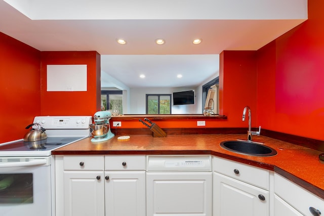 18760 Valencia St, Northville, MI 48168 - kitchen with white cabinetry, a sink, white electric range, and dishwasher