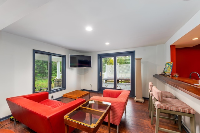 18760 Valencia St, Northville, MI 48168 - living area with baseboards, a wealth of natural light, recessed lighting, and hardwood / wood-style flooring