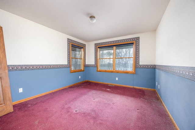 view of carpeted spare room