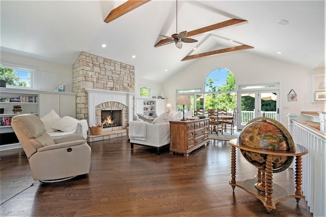 living room featuring beamed ceiling, dark hardwood / wood-style floors, and high vaulted ceiling