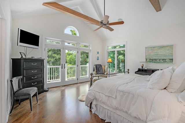 bedroom with multiple windows, ceiling fan, access to outside, and beamed ceiling