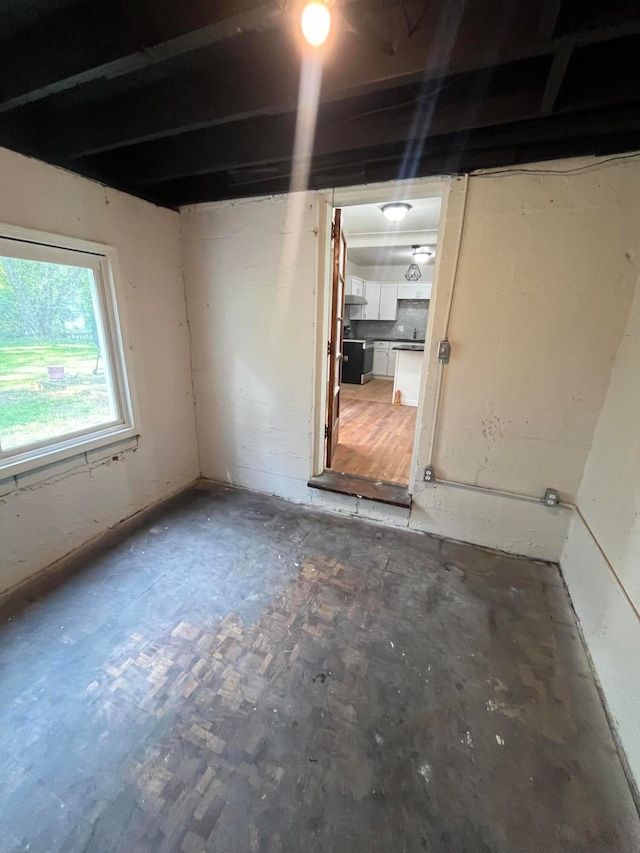 interior space with ceiling fan and wood-type flooring