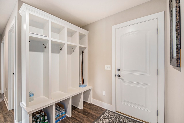 mudroom with dark hardwood / wood-style floors