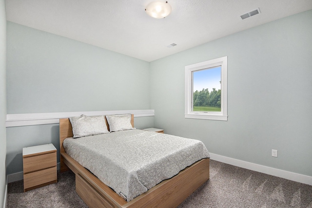 bedroom featuring carpet, baseboards, and visible vents