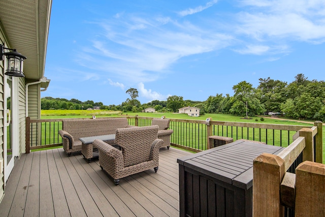 wooden terrace with a lawn