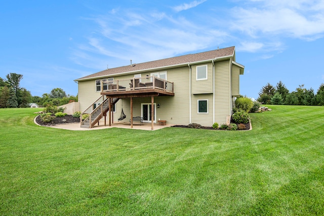 back of house featuring a yard and a patio area