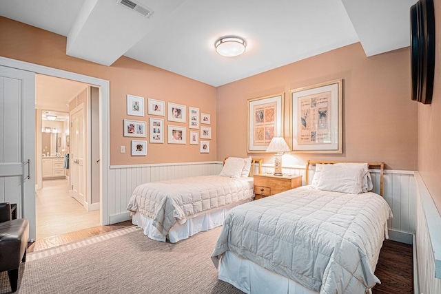 bedroom featuring wood-type flooring