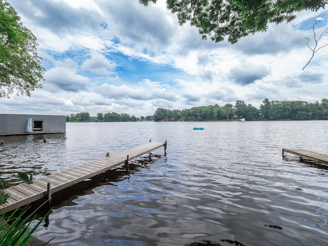 view of dock with a water view