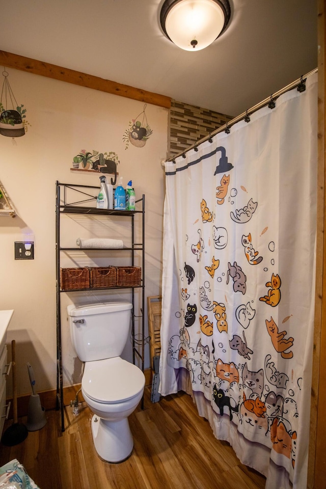 bathroom with vanity, a shower with curtain, wood-type flooring, and toilet