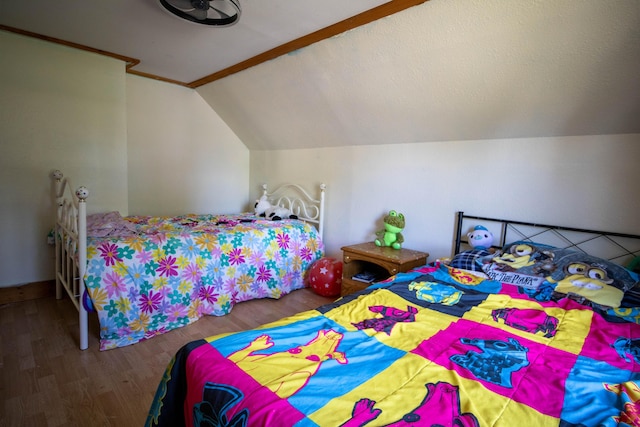 bedroom with lofted ceiling and dark hardwood / wood-style flooring