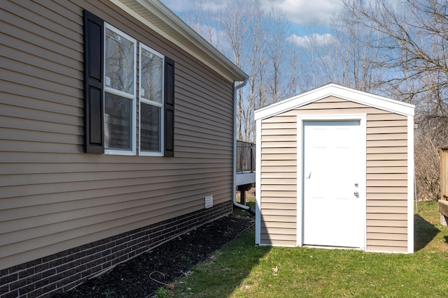 view of outdoor structure with a yard