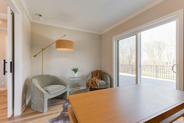 office space with wood-type flooring and ornamental molding