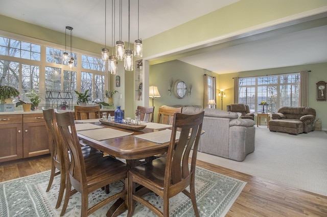 dining space with light wood-style floors