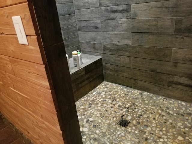 bathroom with wooden walls