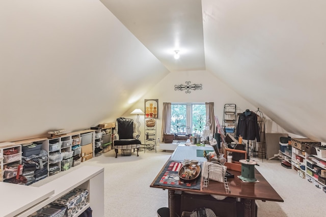 carpeted office with lofted ceiling