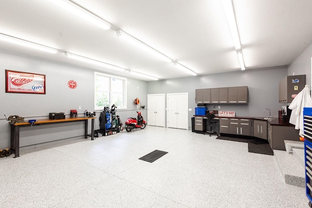 garage featuring a sink