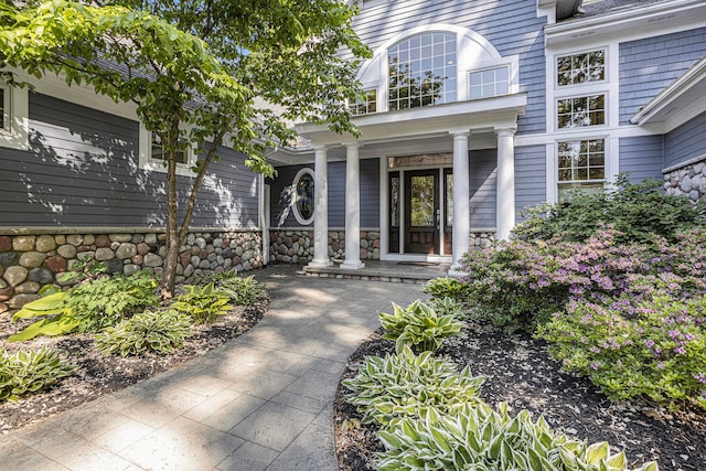 property entrance featuring covered porch