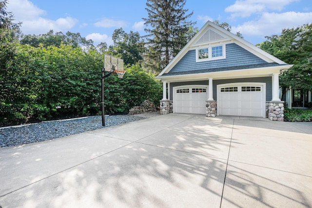 garage featuring driveway