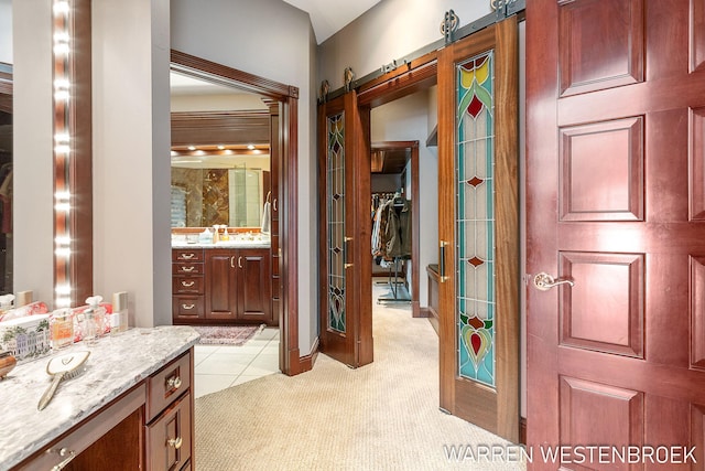 bathroom with vanity and tile patterned floors