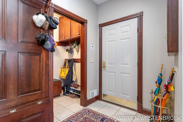 mudroom featuring light tile patterned flooring