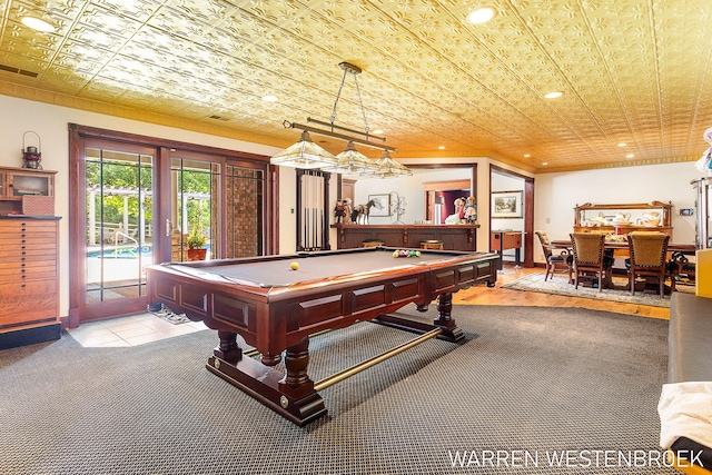 game room with pool table and light colored carpet