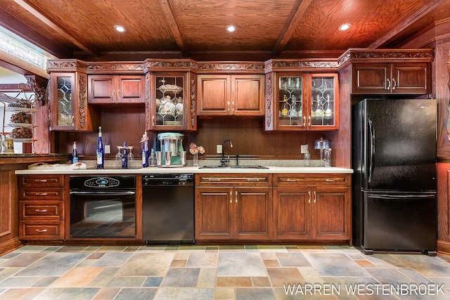 kitchen with wood ceiling, wooden walls, sink, and black appliances