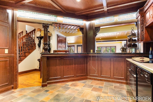 bar with black dishwasher, coffered ceiling, wood ceiling, cooktop, and beam ceiling