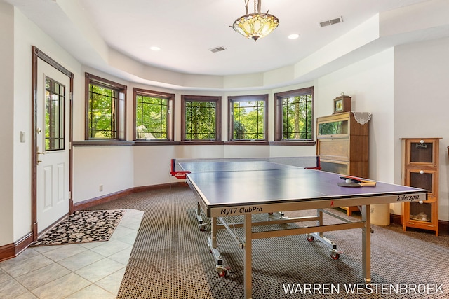 rec room with light tile patterned flooring