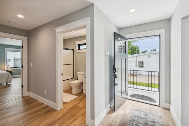 foyer entrance featuring light hardwood / wood-style flooring