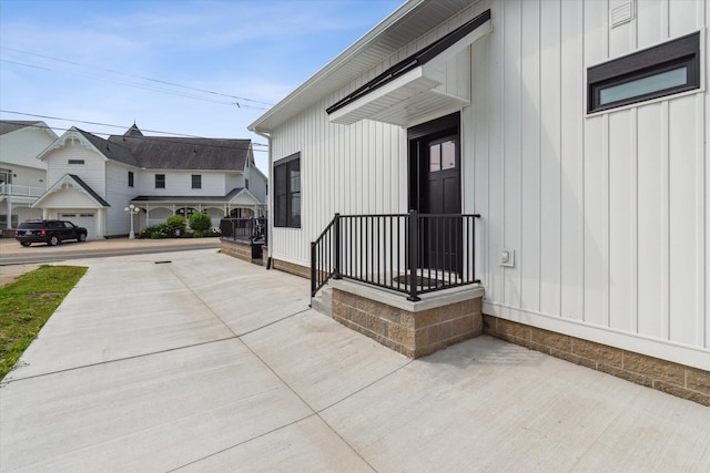 view of property exterior with a garage