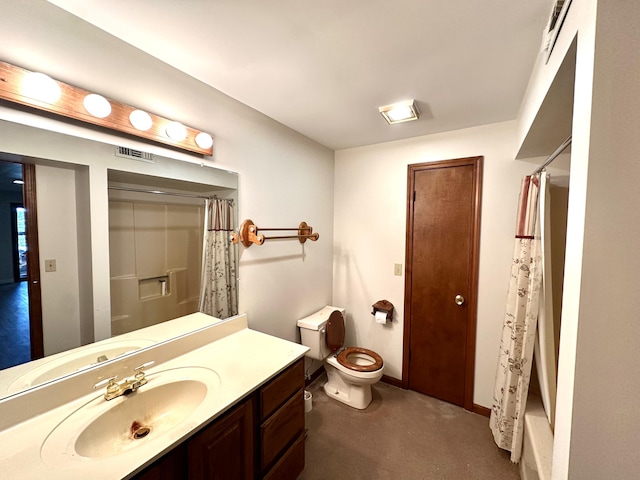 full bathroom with visible vents, baseboards, toilet, and vanity