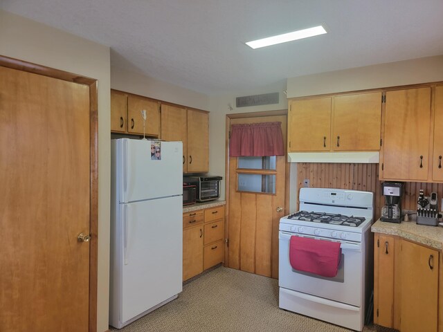 kitchen featuring white appliances