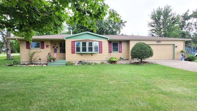 single story home featuring a garage and a front yard