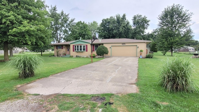 ranch-style house featuring a garage and a front yard