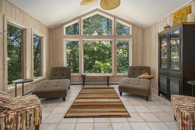 sunroom with lofted ceiling and baseboard heating